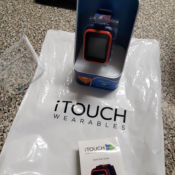 itouch wearables Other - Itouch search watch's kids superman